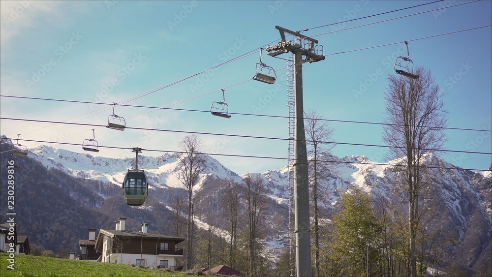 Ski lifts on the background of mountains. Ski lifts in Sochi in the summer.
