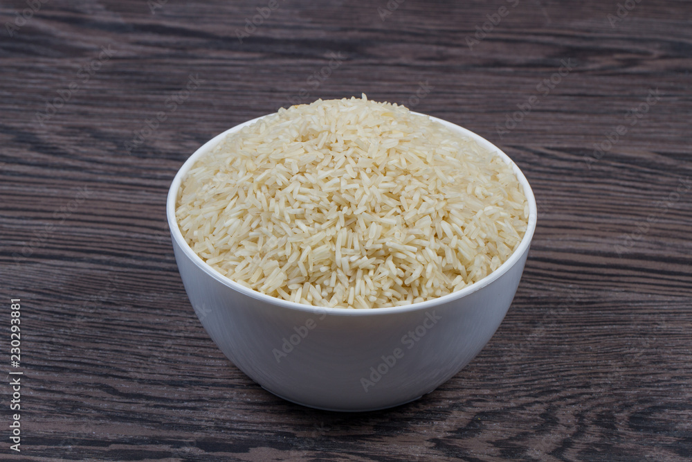 indian basmati rice isolated on texture background. indian basmati rice isolated on texture background.