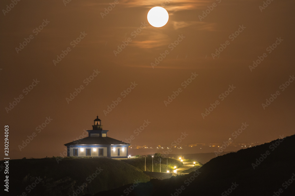 Full moon accompanying the lighthouse!
