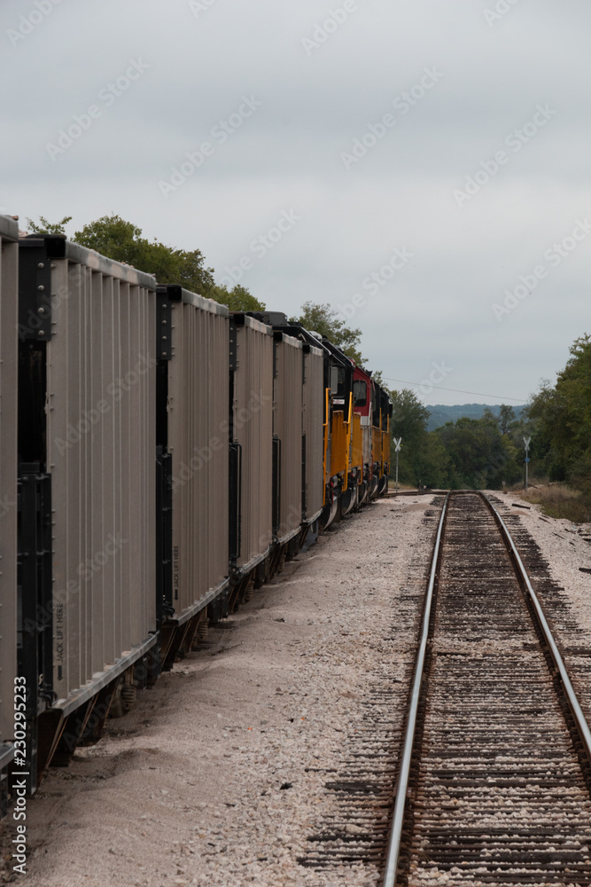 Train Cars in A Line Looking Down A Track to Burnet Texas Train Cars in A Line Looking Down A Track to Burnet Texas