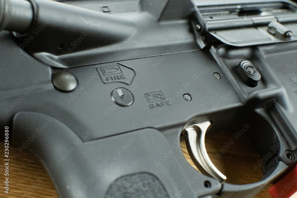 Safety selector switch on an AR15 Rifle Stock Photo Adobe Stock