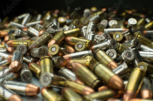 Obraz na plátne Large pile of assorted handgun bullets