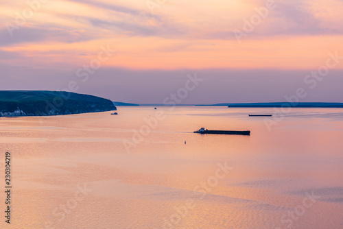 Sunset on navigable river photo