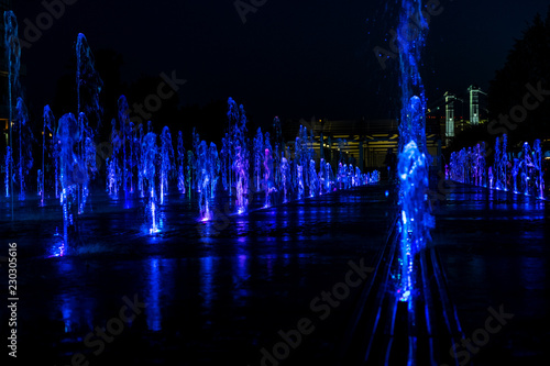lights in the fountain, bright blue colors.