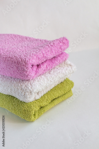 stack of towels isolated on white background