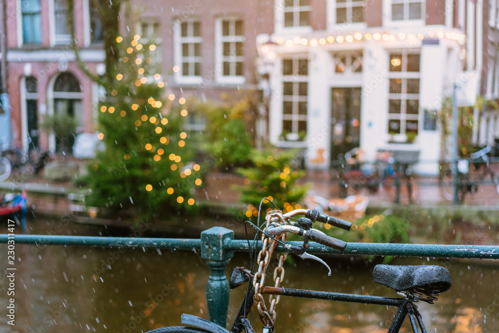 Bicycles lining a bridge over the canals of Amsterdam Bicycles lining a bridge over the canals of Amsterdam