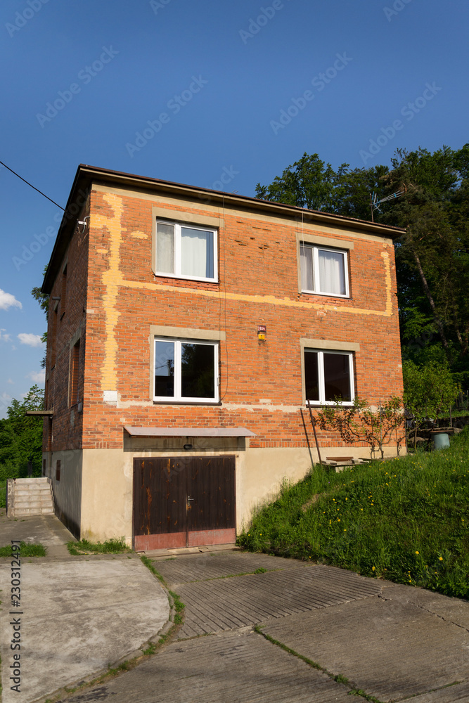 Typified red brick family Bata houses in Zlin, Moravia, Czech Republic, sunny summer day