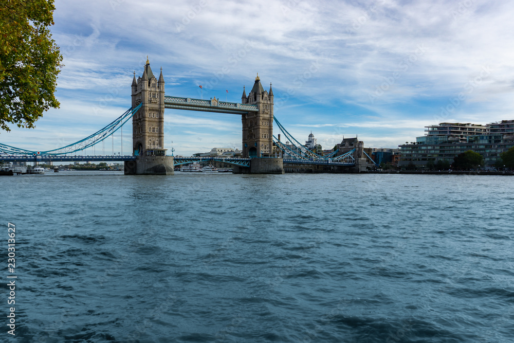 Tower Bridge on Thames river looking in London, England, UK