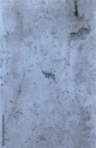 White marble texture with natural pattern for background or design work. Polished matte surface of natural marble background with a deep abstract pattern of expensive luxury stone for the interior © Aleksandr Lesik