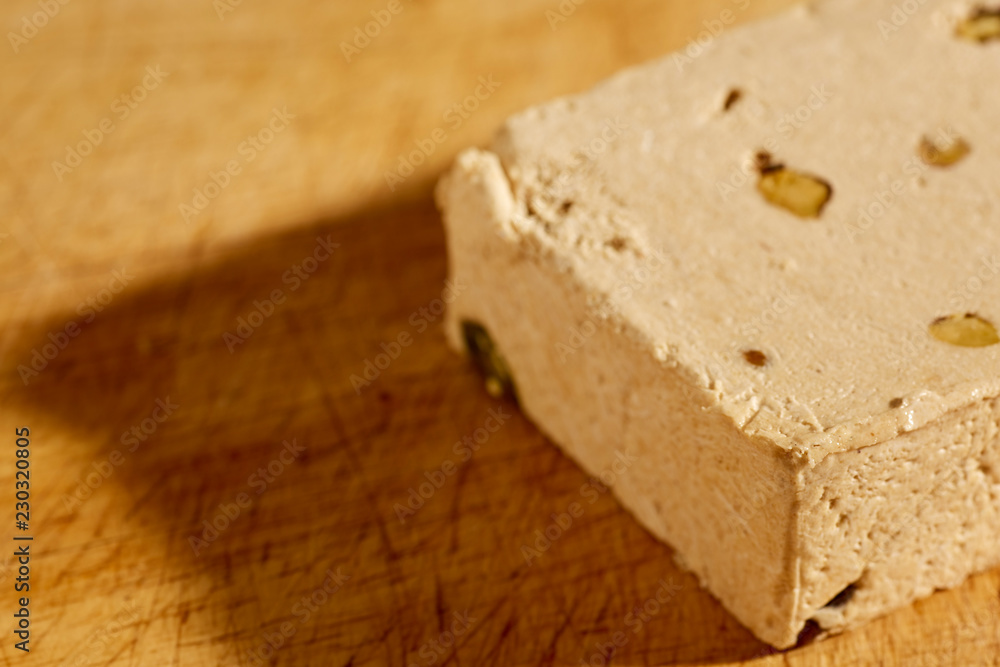 A block of American style Halavah with pistachios. A block of American style Halavah with pistachios.