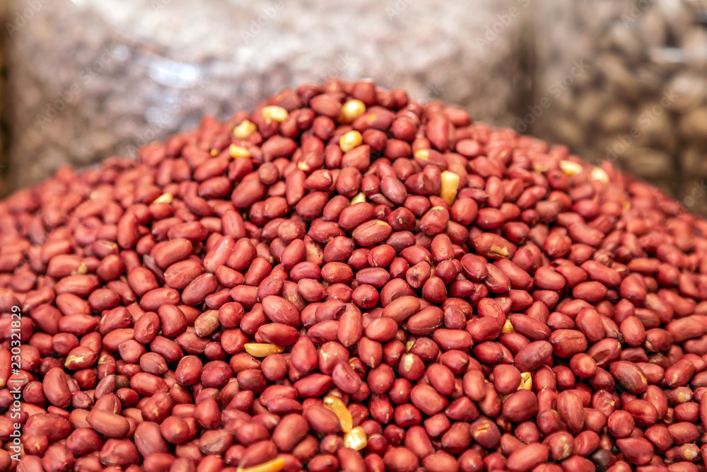 Peanuts exposed for sale on the market. Food photography, closeup. Peanuts exposed for sale on the market. Food photography, closeup.