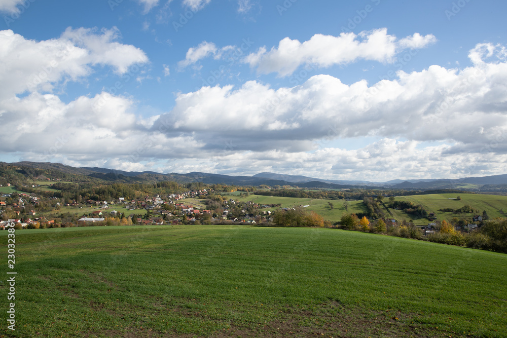 A view of the hill called Helfštýn on the field and the surrounding can be seen village Krhová during a sunny day