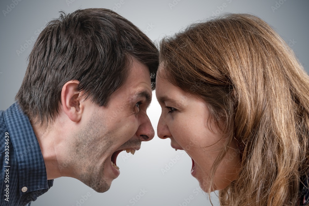 Young couple shouting each other. Divorce concept. Young couple shouting each other. Divorce concept.