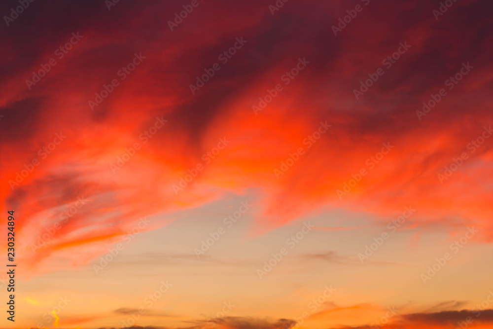 Fototapeta premium Clouds of beautiful color in the fall. Sunset pink red orange color.