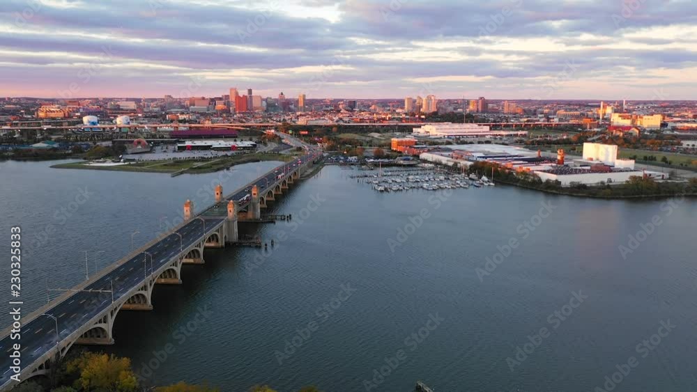 Sunset comes to Baltimore Maryland in this aerial view over harbor bridge Sunset comes to Baltimore Maryland in this aerial view over harbor bridge