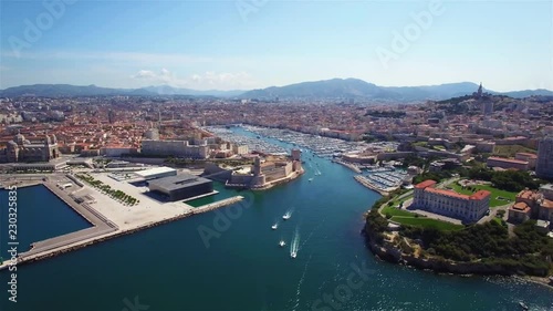 4K Aerial view of Marseille pier - Vieux Port, Saint Jean castle, and mucem in south of France photo