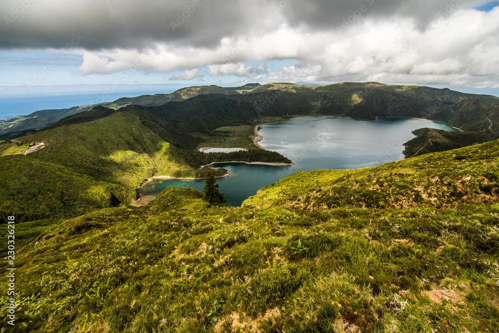 Lake of Fire or Lagoa do Fogo in the crater of the volcano Pico do Fogo on the island of Sao Miguel. Sao Miguel is part of the Azores archipelago in the Atlantic Ocean.