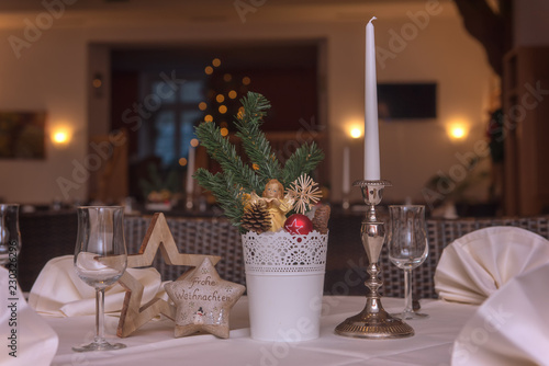Christmas decorations on the table set the mood for the festive season. Concept  holidays and christmas