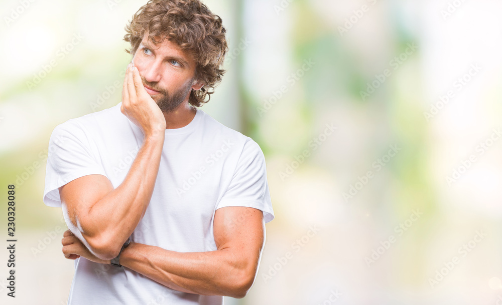 Handsome hispanic model man over isolated background with hand on chin thinking about question, pensive expression. Smiling with thoughtful face. Doubt concept. Handsome hispanic model man over isolated background with hand on chin thinking about question, pensive expression. Smiling with thoughtful face. Doubt concept.