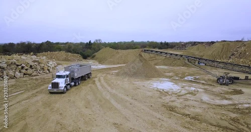 Flying over Semi Truck in Limestone Mine