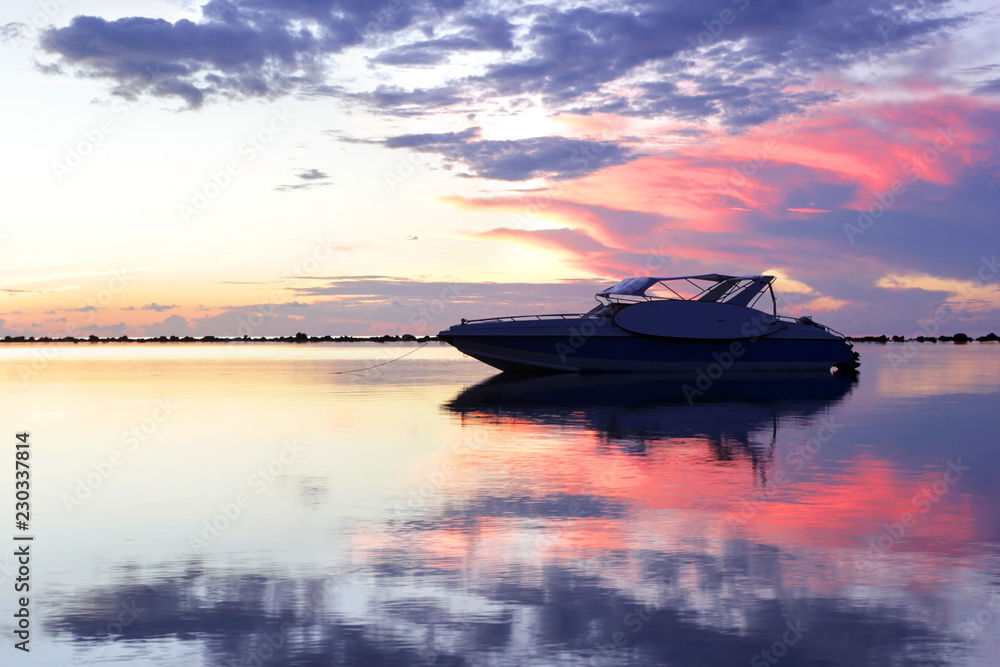 speed boat in the sea with beautiful sunrise speed boat in the sea with beautiful sunrise