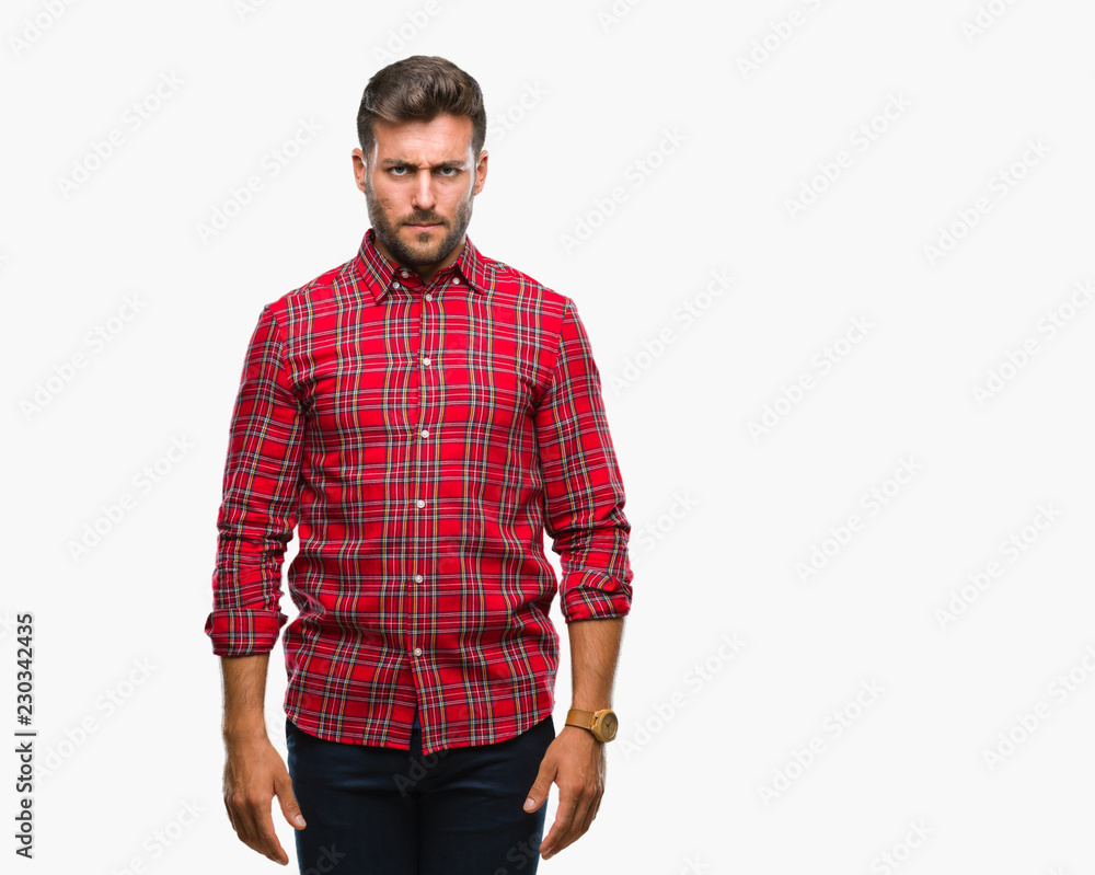 Young handsome man over isolated background skeptic and nervous, frowning upset because of problem. Negative person. Young handsome man over isolated background skeptic and nervous, frowning upset because of problem. Negative person.