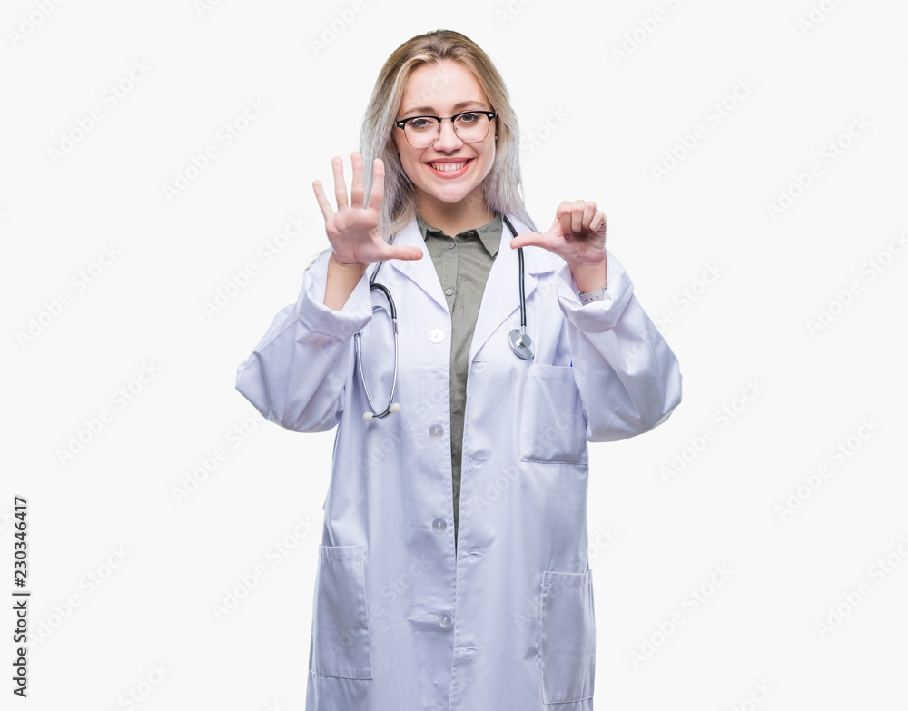 Young blonde doctor woman over isolated background showing and pointing up with fingers number six while smiling confident and happy.