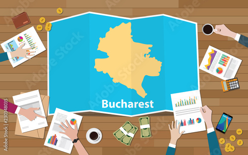 bucharest romania capital city region economy growth with team discuss on fold maps view from top