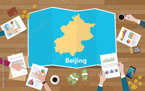 beijing china capital city region economy growth with team discuss on fold maps view from top