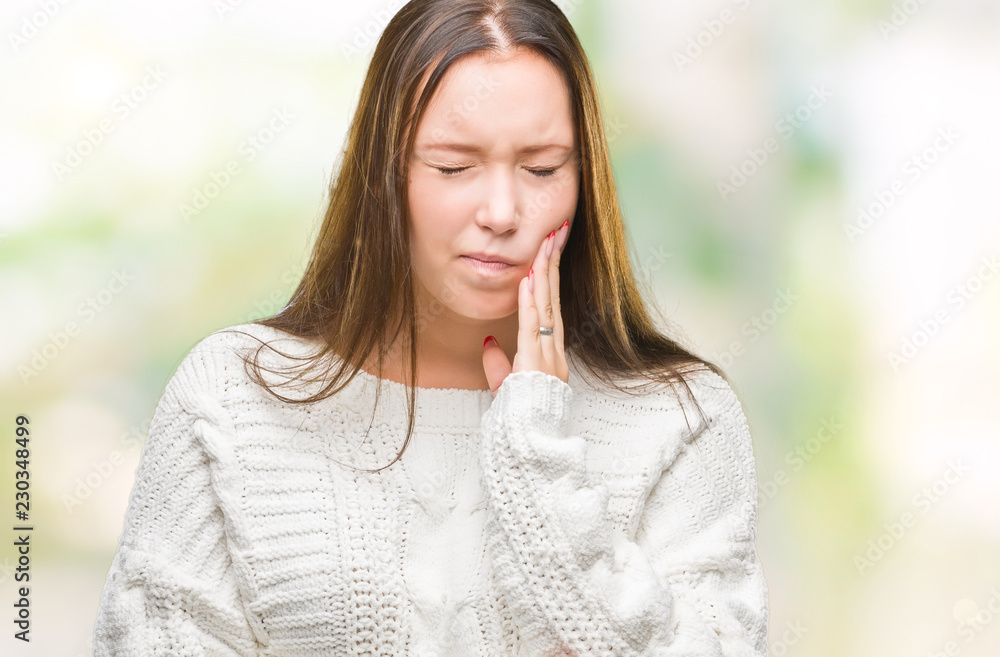 Young beautiful caucasian woman wearing winter sweater over isolated background touching mouth with hand with painful expression because of toothache or dental illness on teeth. Dentist concept.