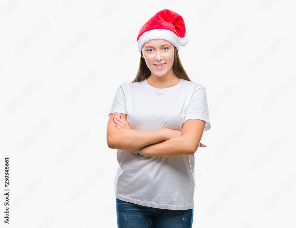 Young beautiful caucasian woman wearing christmas hat over isolated background happy face smiling with crossed arms looking at the camera. Positive person. Young beautiful caucasian woman wearing christmas hat over isolated background happy face smiling with crossed arms looking at the camera. Positive person.