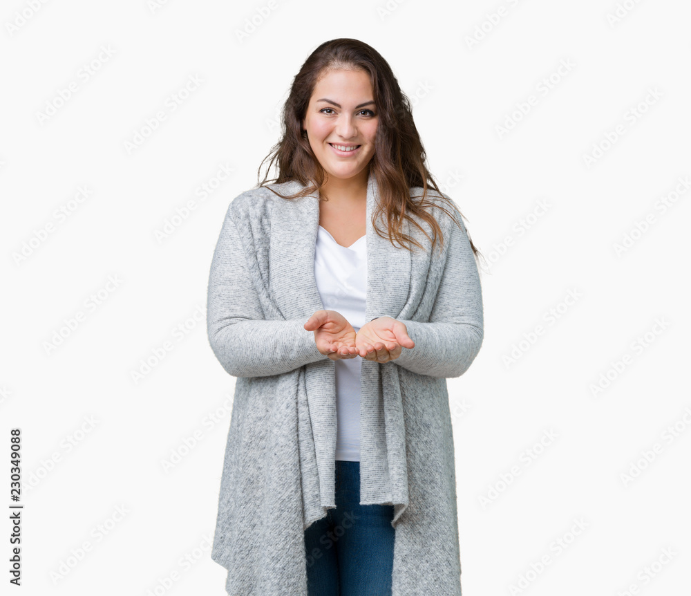 Beautiful plus size young woman wearing winter jacket over isolated background Smiling with hands palms together receiving or giving gesture. Hold and protection Beautiful plus size young woman wearing winter jacket over isolated background Smiling with hands palms together receiving or giving gesture. Hold and protection