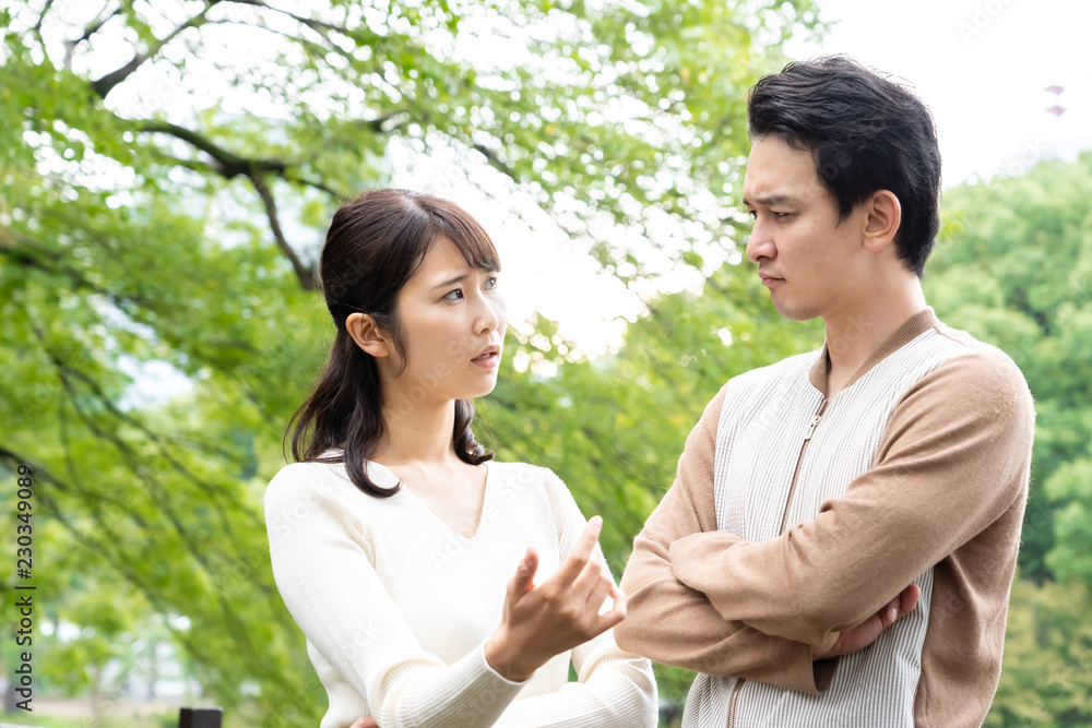 young asian couple in park