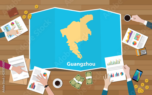 guangzhou canton china city region economy growth with team discuss on fold maps view from top