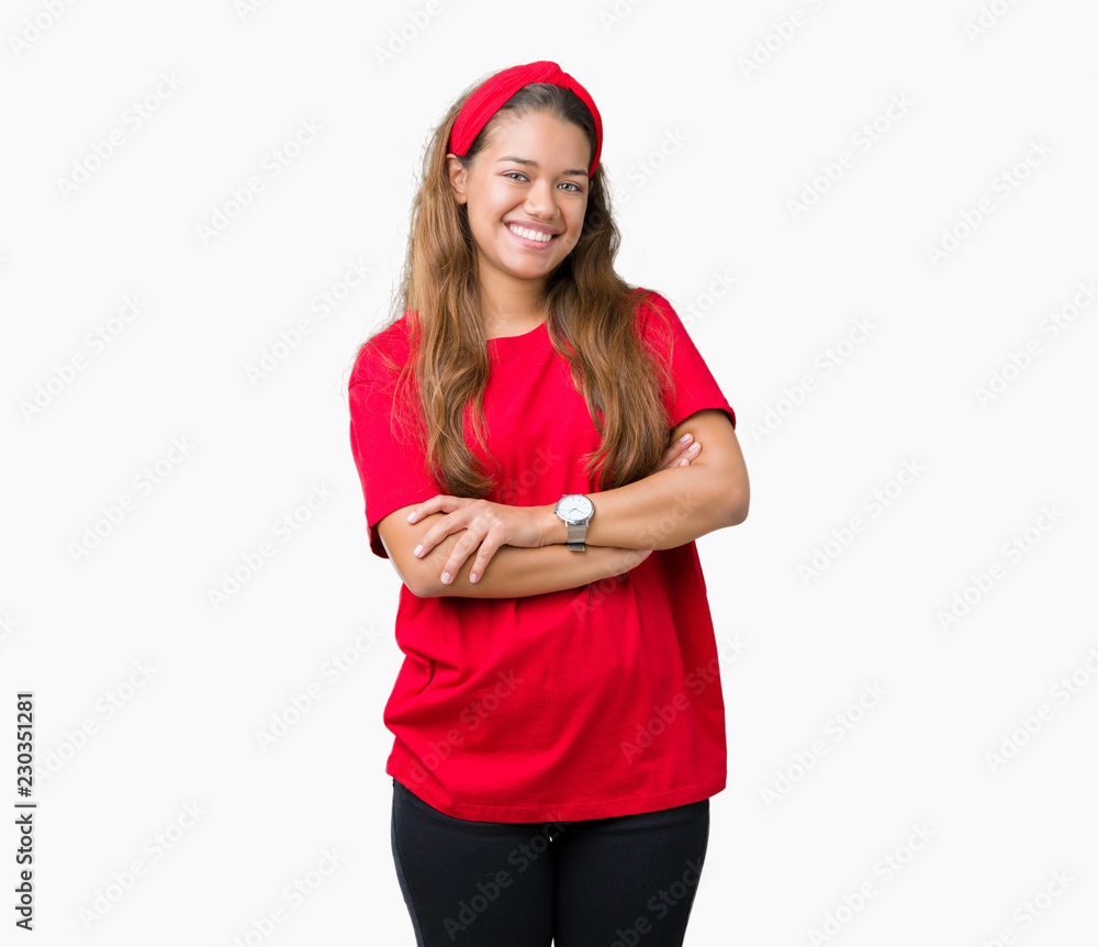 Young beautiful brunette woman wearing red t-shirt over isolated background happy face smiling with crossed arms looking at the camera. Positive person. Young beautiful brunette woman wearing red t-shirt over isolated background happy face smiling with crossed arms looking at the camera. Positive person.