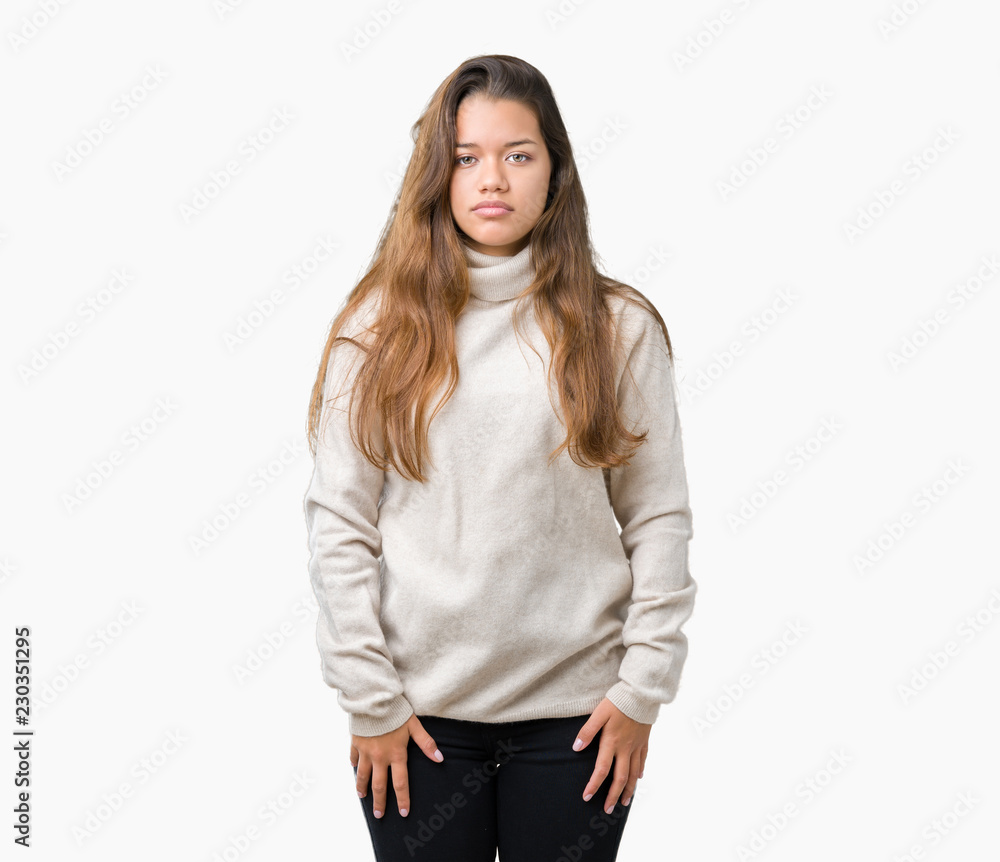 Young beautiful brunette woman wearing turtleneck sweater over isolated background Relaxed with serious expression on face. Simple and natural looking at the camera. Young beautiful brunette woman wearing turtleneck sweater over isolated background Relaxed with serious expression on face. Simple and natural looking at the camera.