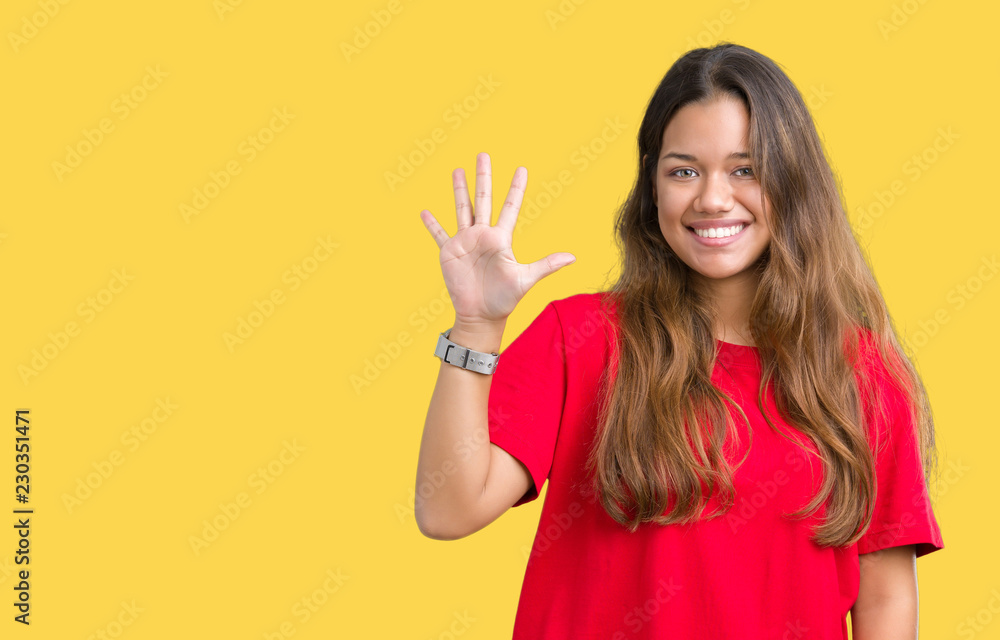 Young beautiful brunette woman wearing red t-shirt over isolated background showing and pointing up with fingers number five while smiling confident and happy. Young beautiful brunette woman wearing red t-shirt over isolated background showing and pointing up with fingers number five while smiling confident and happy.