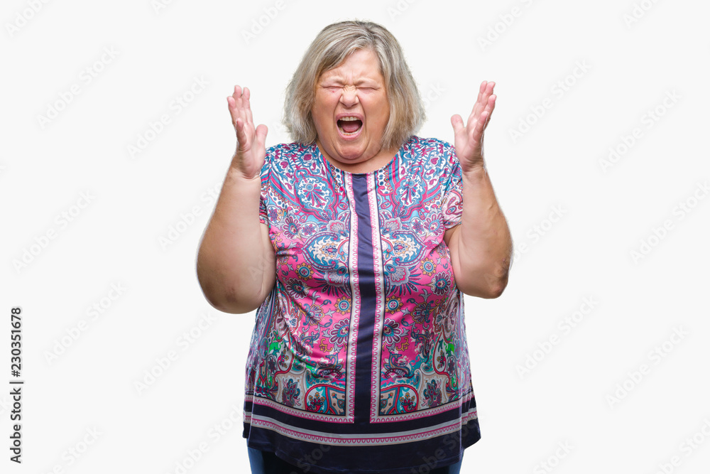 Senior plus size caucasian woman over isolated background celebrating mad and crazy for success with arms raised and closed eyes screaming excited. Winner concept Senior plus size caucasian woman over isolated background celebrating mad and crazy for success with arms raised and closed eyes screaming excited. Winner concept