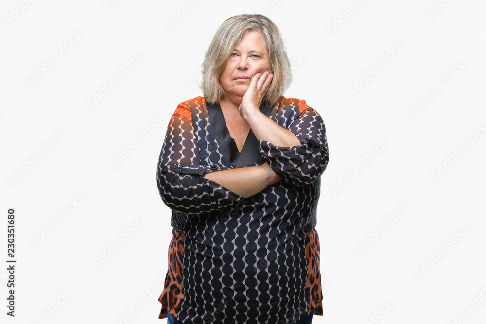 Senior plus size caucasian woman over isolated background thinking looking tired and bored with depression problems with crossed arms. Senior plus size caucasian woman over isolated background thinking looking tired and bored with depression problems with crossed arms.