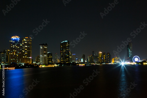 light of city on  the river at night © pandaclub23