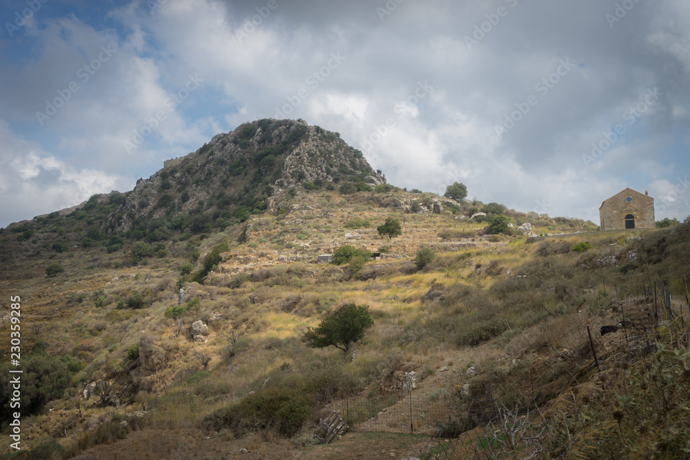 Hania, Crete - 09 25 2018: Polirinia. Small mountain village with archaeological remains and small church