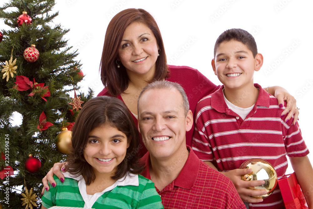 Happy Hispanic family at Christmas exchanging gifts. Happy Hispanic family at Christmas exchanging gifts.