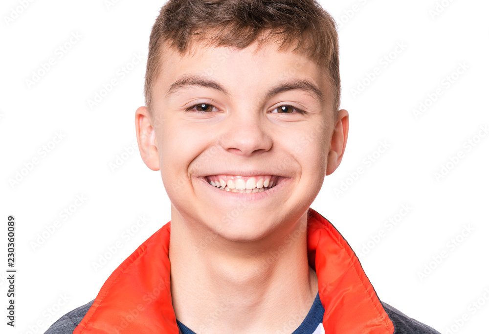 Portrait of smiling teen boy. Headshot cute teenager looking at camera. Happy child isolated on white background. Portrait of smiling teen boy. Headshot cute teenager looking at camera. Happy child isolated on white background.