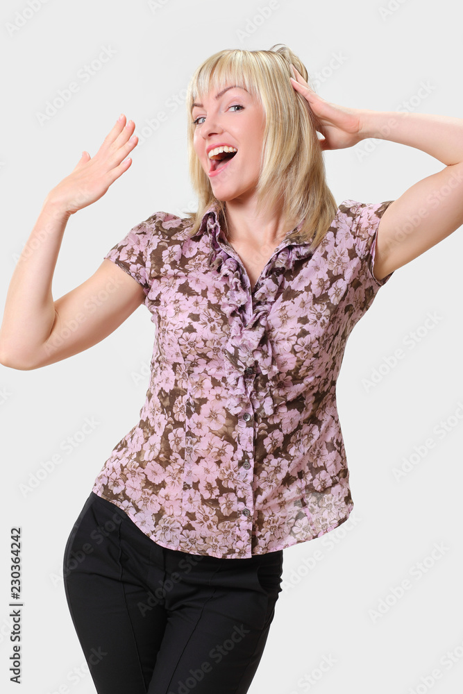 Crazy young blonde woman makes squint for fun