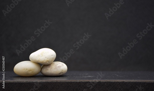 Canvas Print Setting pyramid stone on table with free space