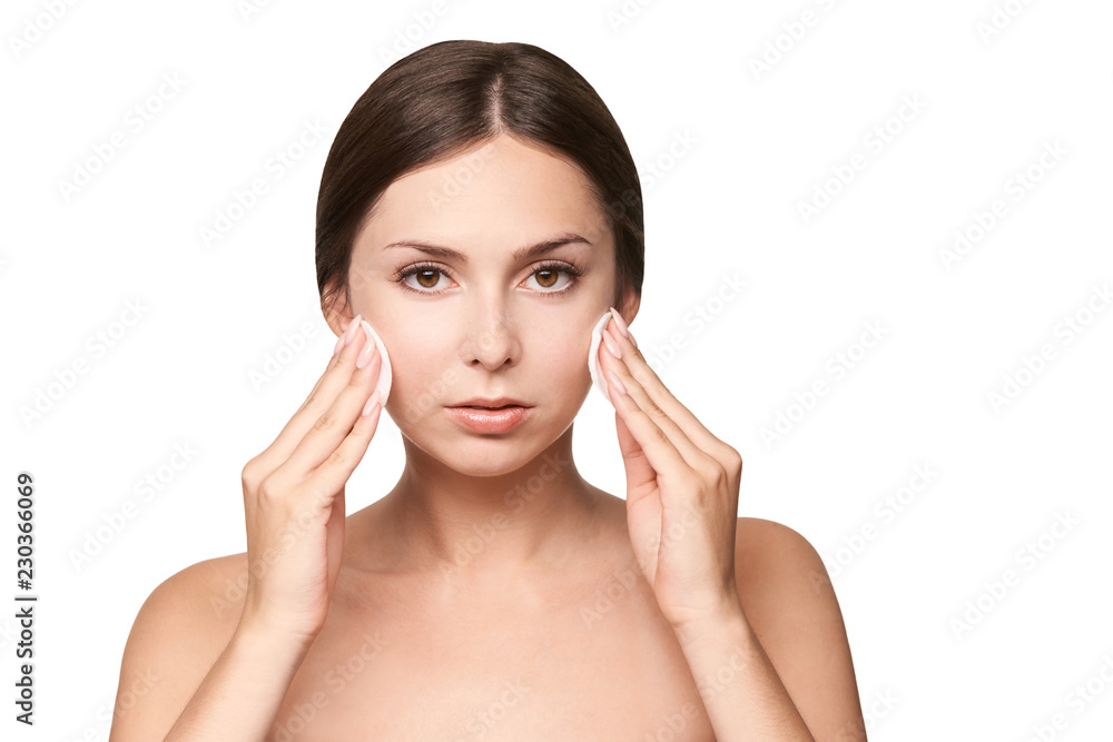 Cleansing face washing tonic. Demakeup. Remove mascara. Cotton pad hand