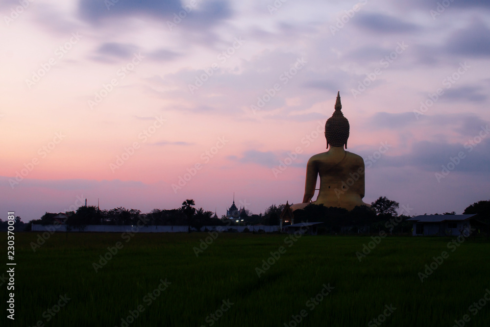 Buddha with sunset.