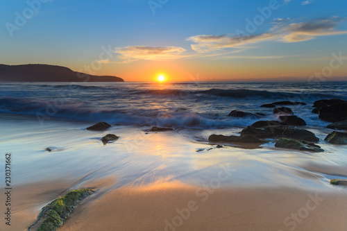 Fototapeta Naklejka Na Ścianę i Meble -  Sun, Sand, Sea and Rocky Sunrise