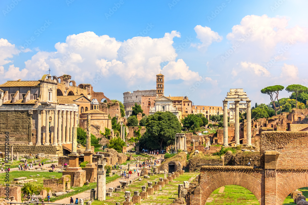 View on the Roman Forum: The Temple of Antoninus and Faustina, The Temple of Venus and Rome, the Temple of Castor and Pollux and the Coliseum