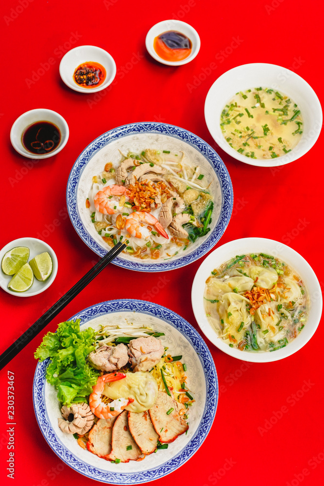 Set of Vietnamese Noodles with Pork and Shrimp Recipe bowl combo on the red carpet Set of Vietnamese Noodles with Pork and Shrimp Recipe bowl combo on the red carpet